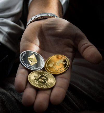 closeup-photo-of-three-round-coins-in-person-s-palm-1097946